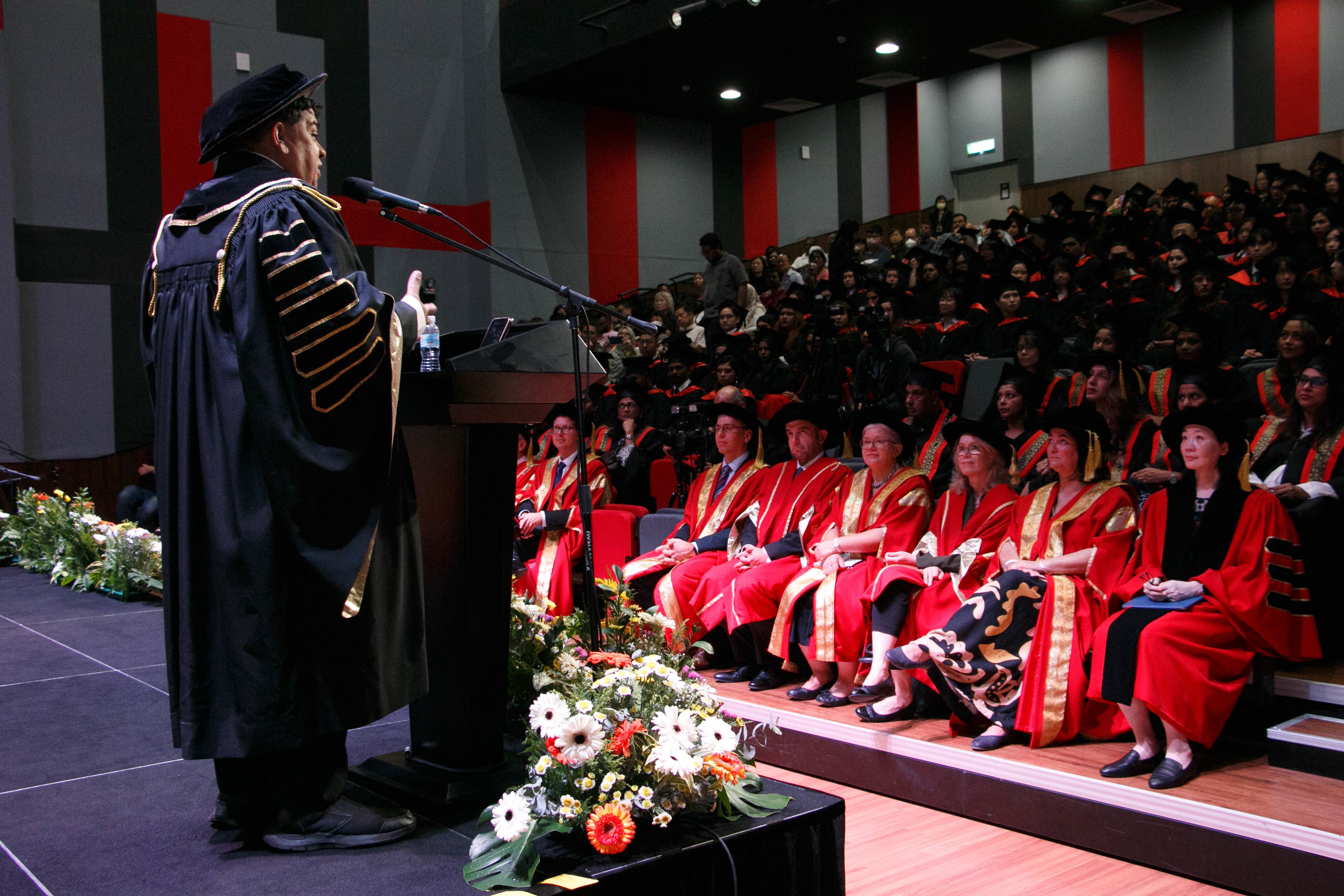 Raja Singham addresses the graduates and their parents at the 2023 BAC Convocation Ceremony