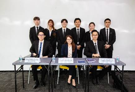 A group of people in suits

AI-generated content may be incorrect.