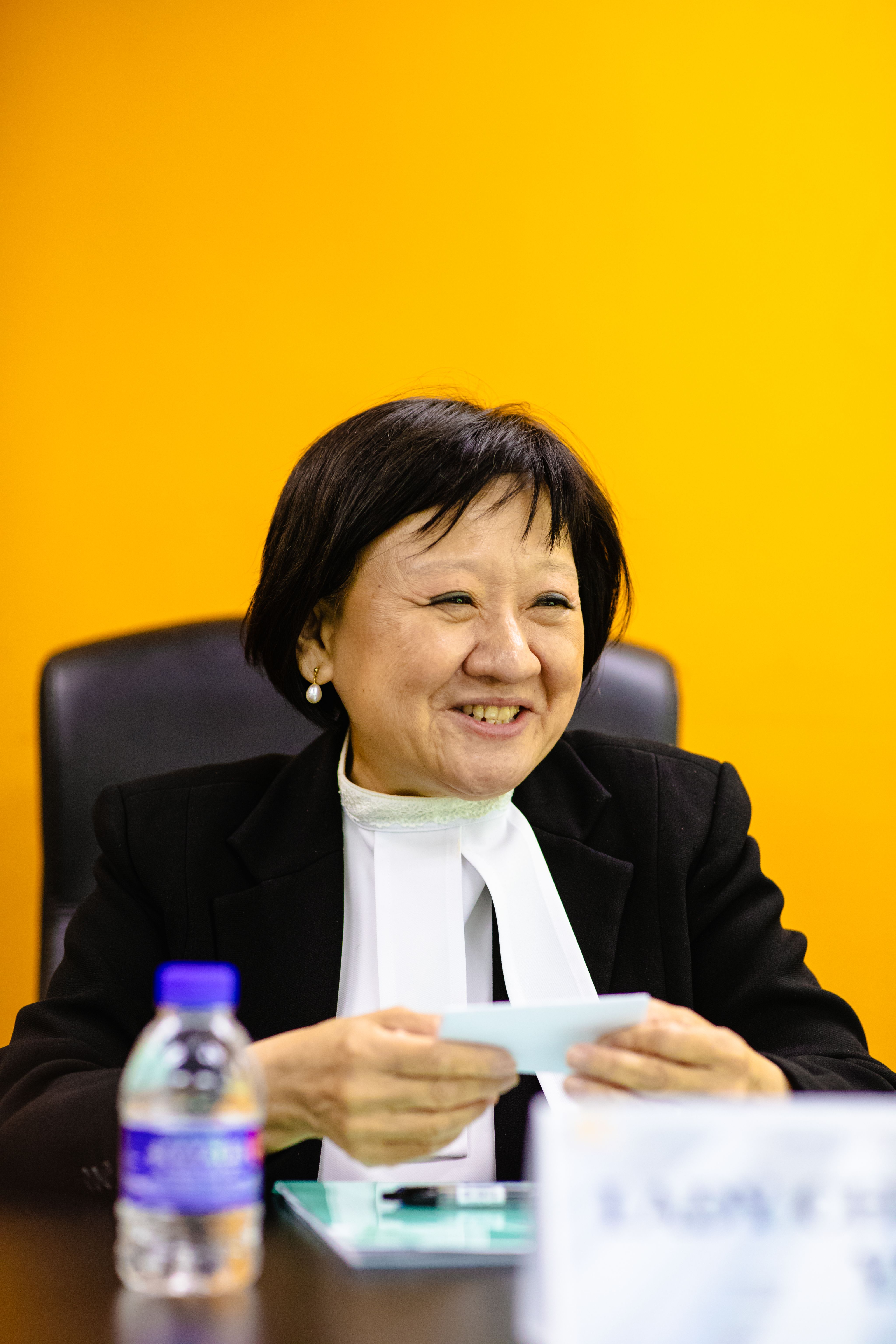 A person smiling at a computer

AI-generated content may be incorrect.