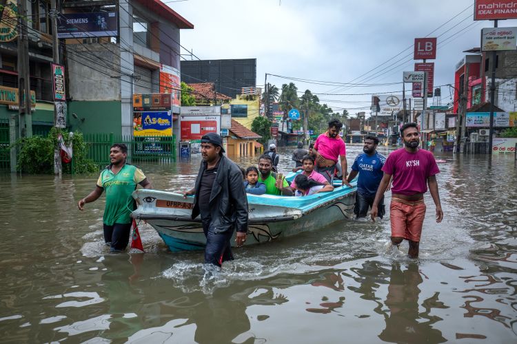 Boats Rented to Rescue Stranded Flood Victims as Rising Waters Cut Off Road Access