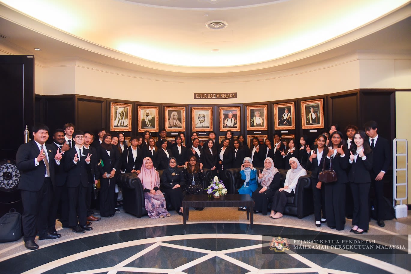 man in black jacket smoking cigarette