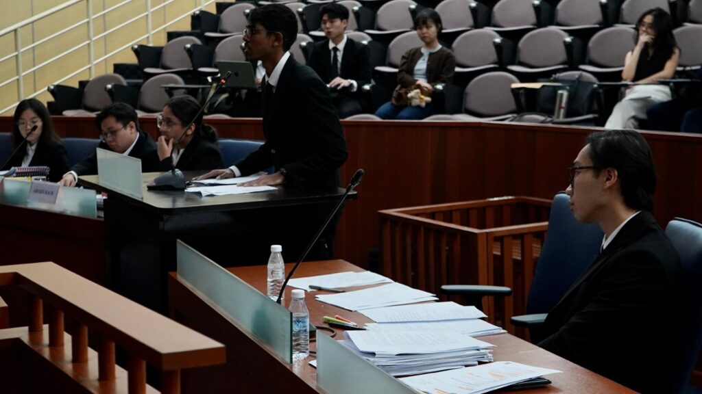 Joshua Paren Paul receiving the Best Oralist Award at the Jessup national rounds