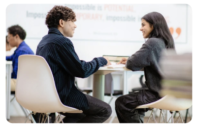Student speaking with a course counsellor